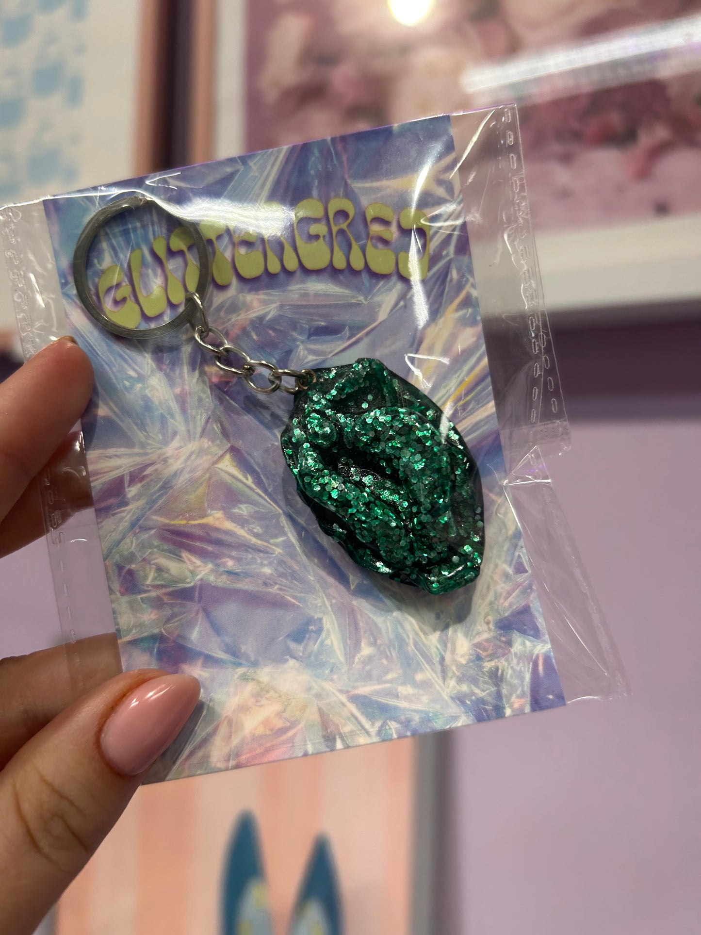 Glittergrej Tissekone nøglering