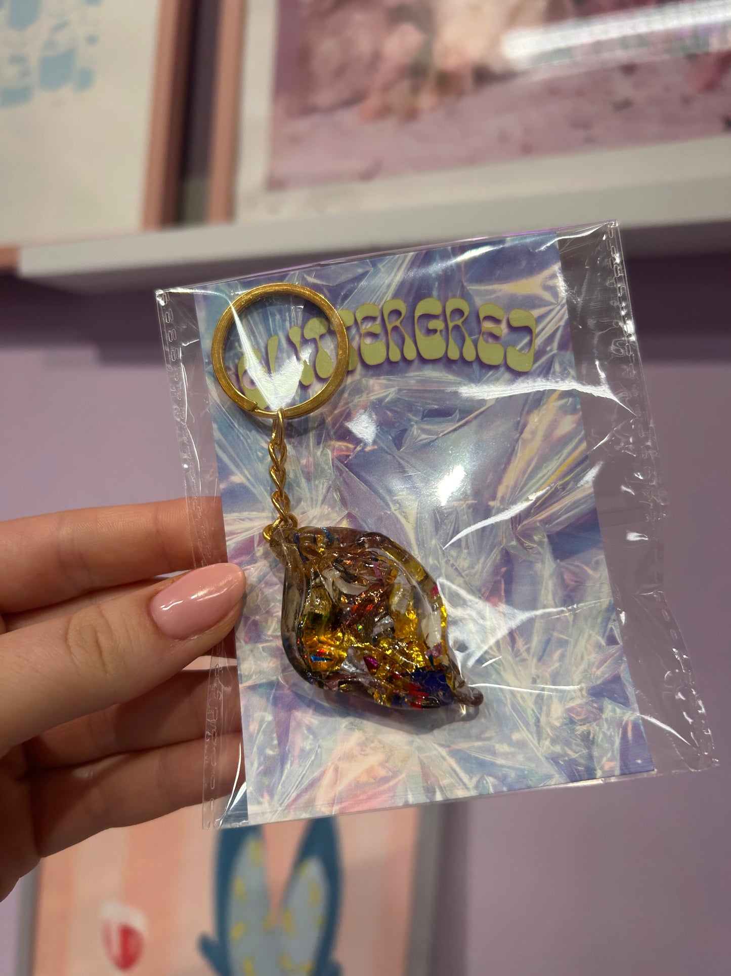 Glittergrej Tissekone nøglering